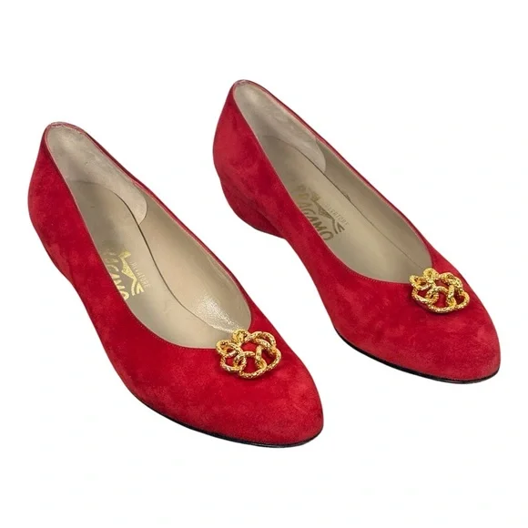 Salvatore Ferragamo red suede pumps featuring a gold-toned ornamental buckle
